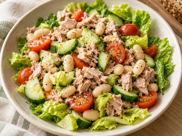 AI-generated serving illustration of Tuna, white bean & cucumber salad