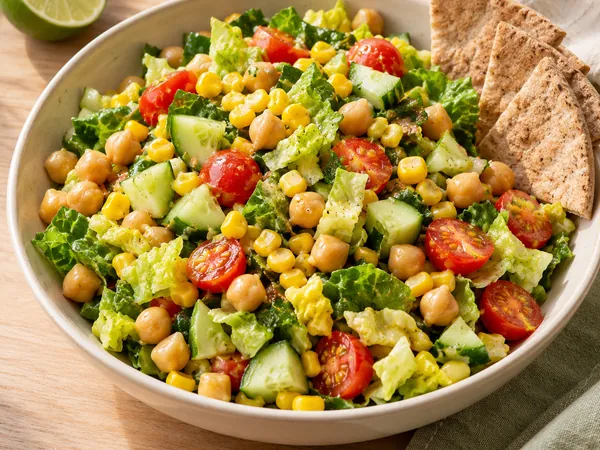 AI-generated serving illustration of Summer corn & chickpea chopped salad